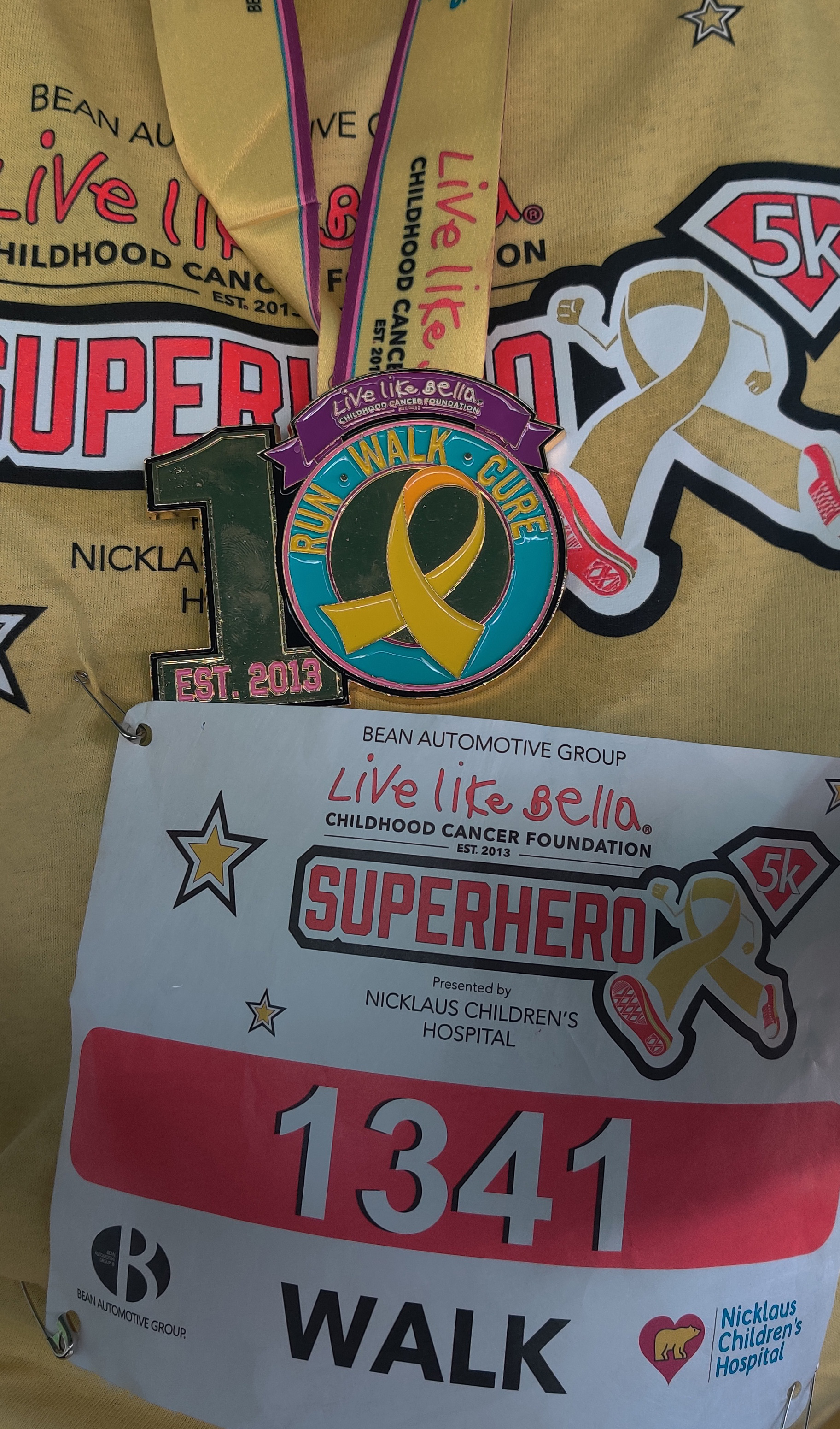 Live Like Bella Superhero 5K Medal close-up