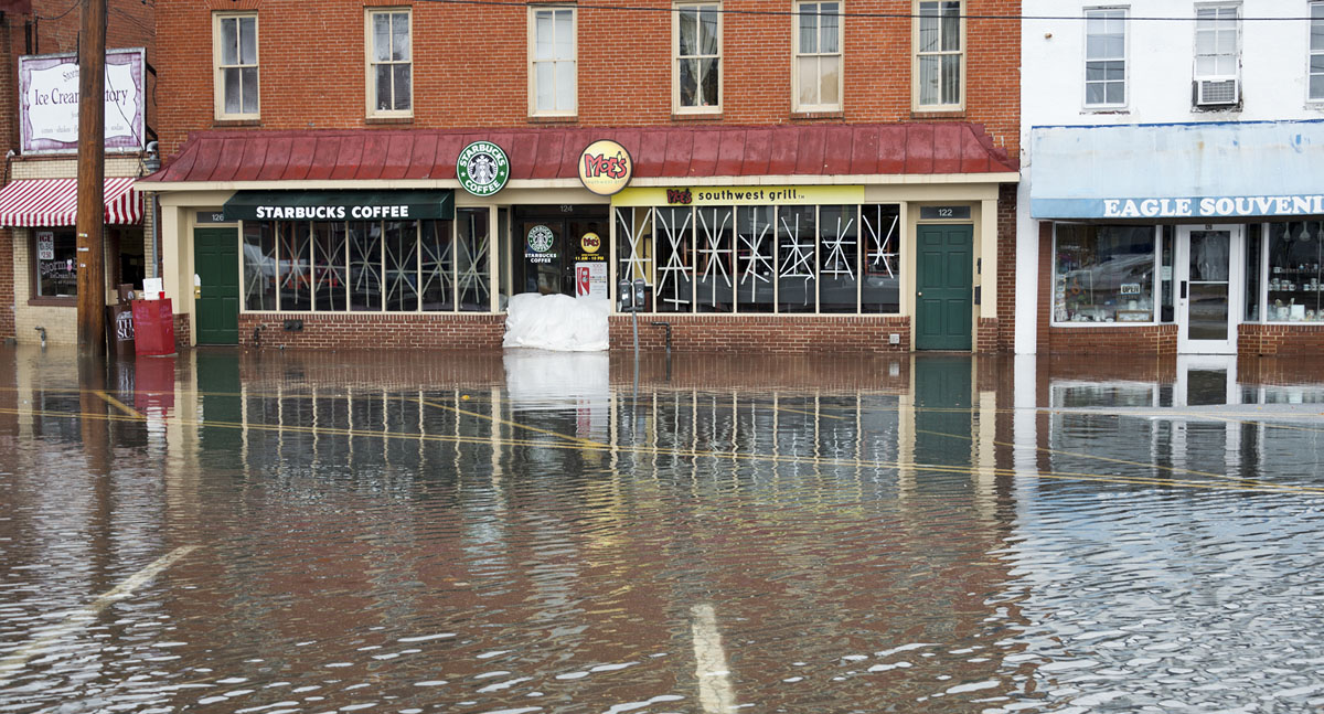 Small businesses surrounded by flood waters.